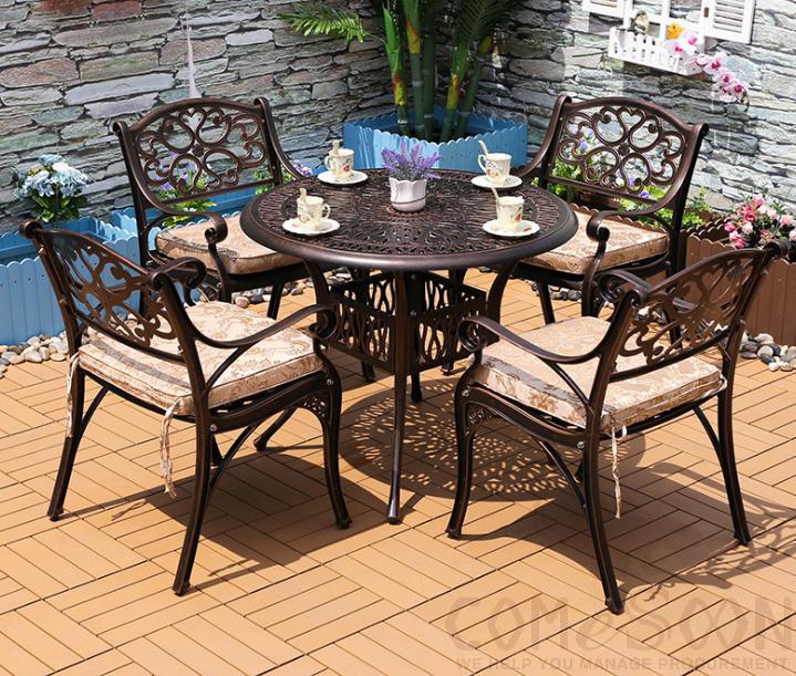 Outdoor cast aluminum tables and chairs